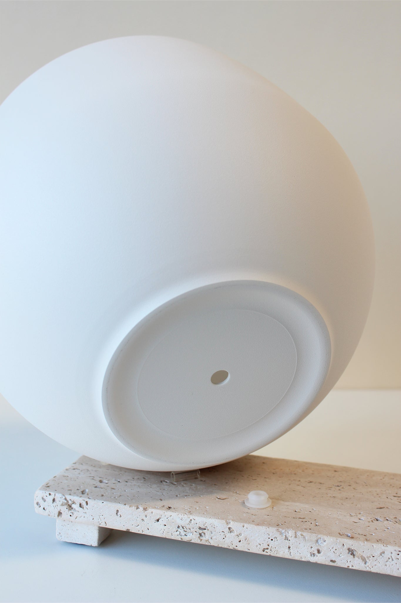 large white pot with drainage hole and plug