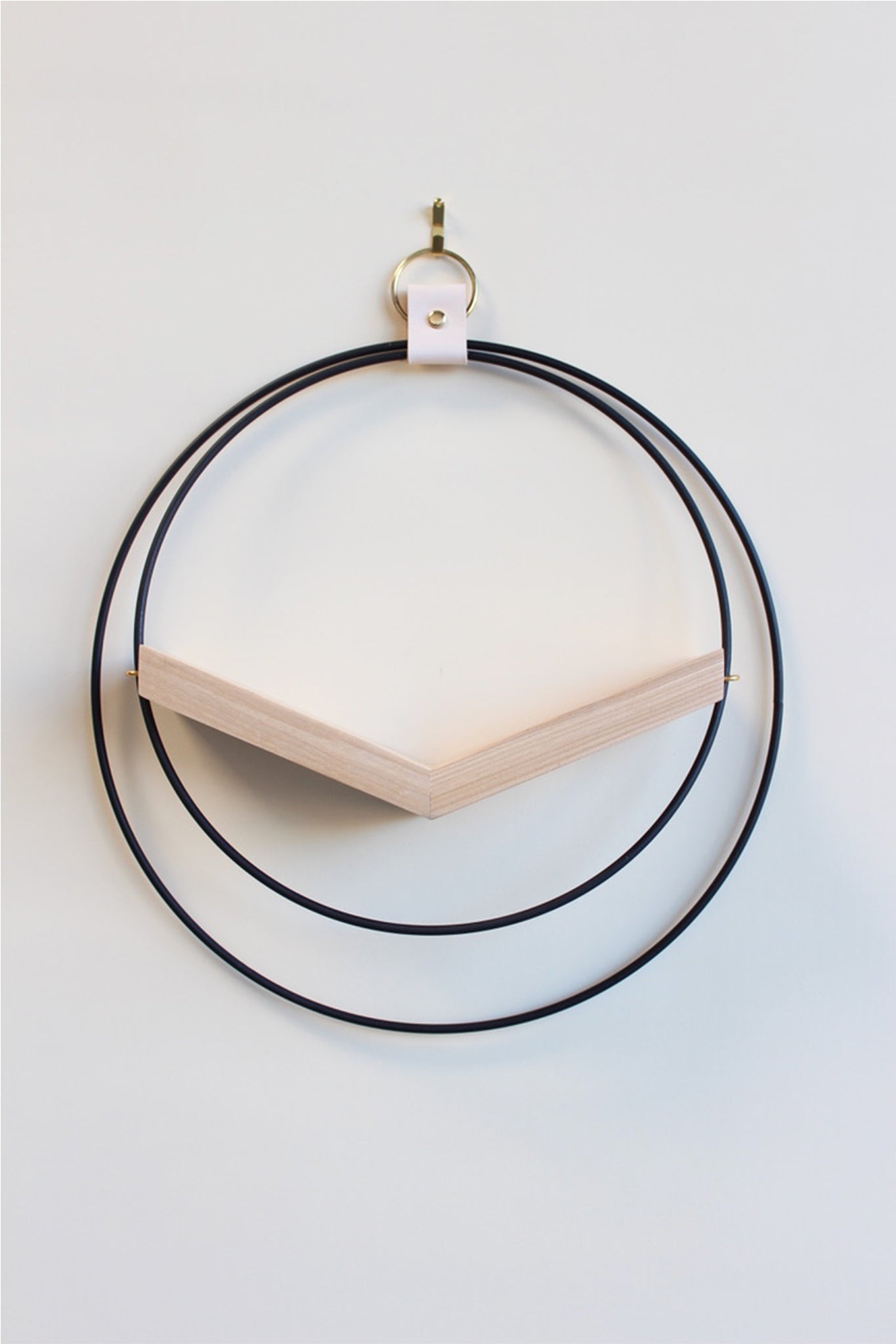 modern wall mounted large v shaped air plant hanger with matte black rings and light wood v shelf