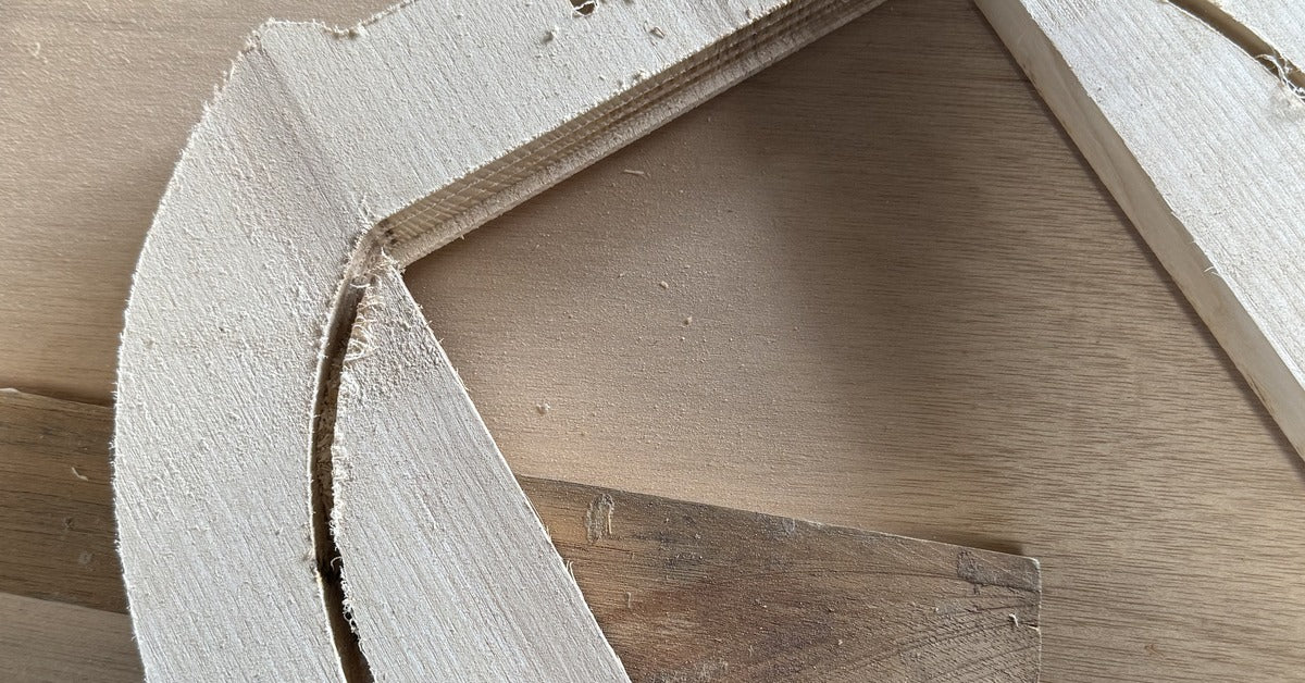 raw white ash hardwood material for braid & wood nested plant stand. sitting on wood table