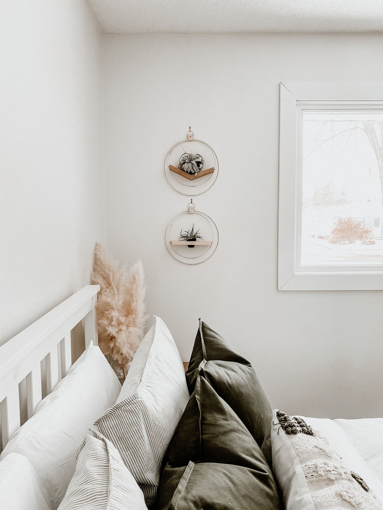 wall mounted plant shelves from braid & wood styled on white wall in bedroom