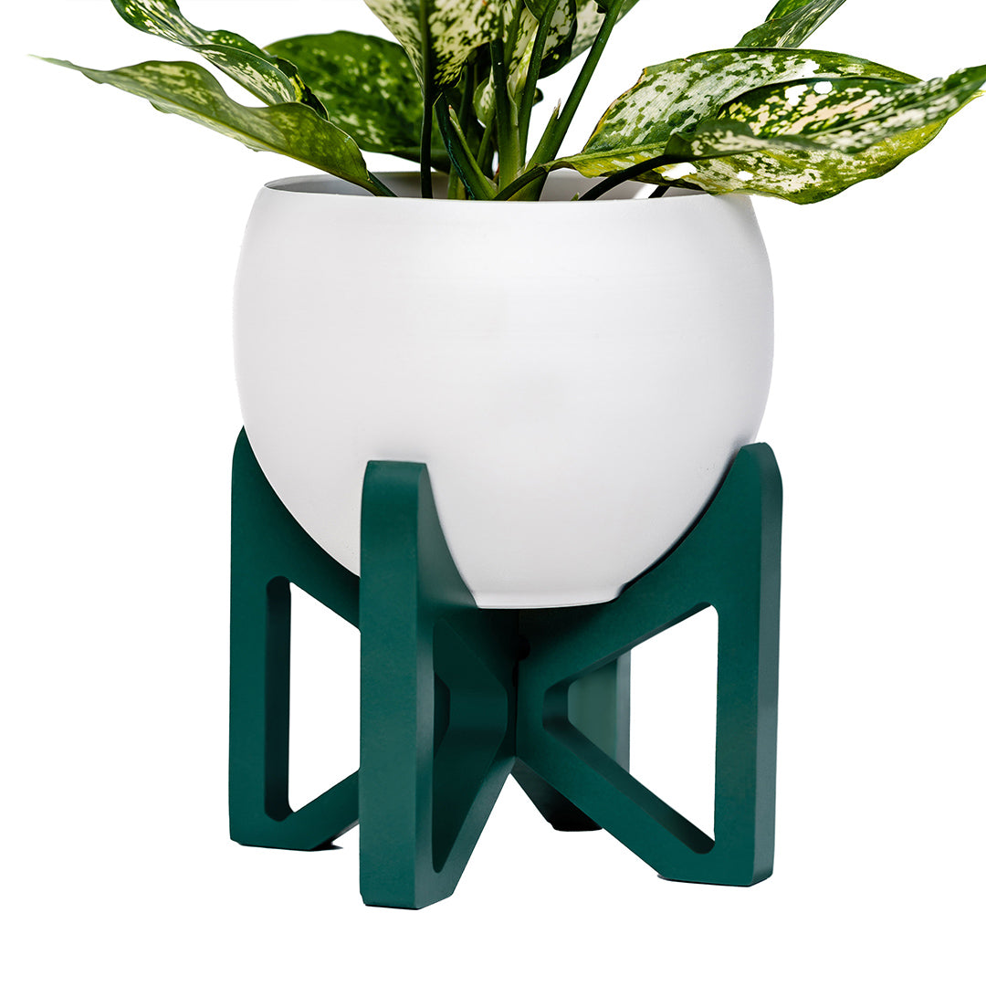 emerald green wood plant stand with aluminum white aluminum pot and houseplant