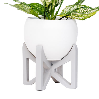 gray colored wood plant stand with aluminum white pot