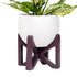 purple colored wood tabletop plant stand and white aluminum pot