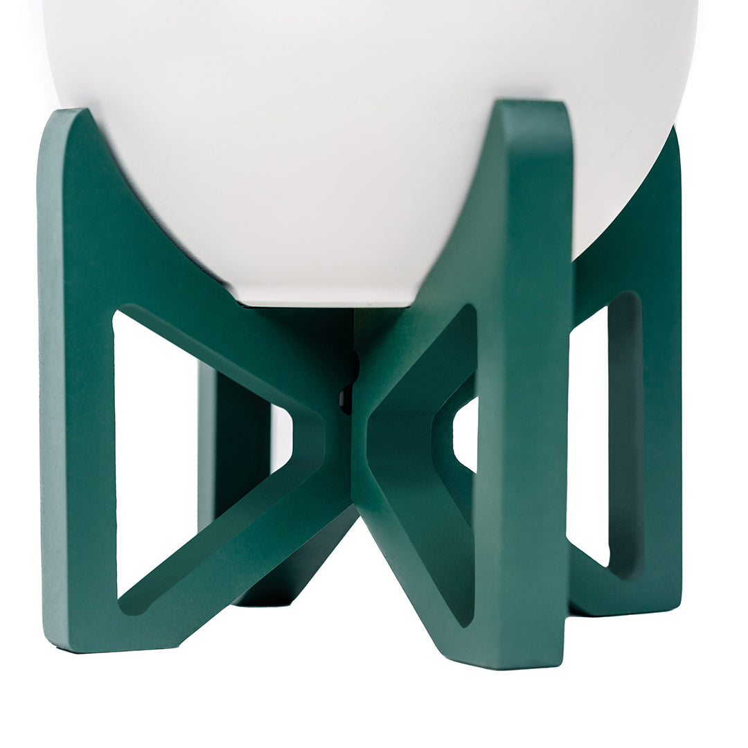 close up view of emerald green tabletop plant stand