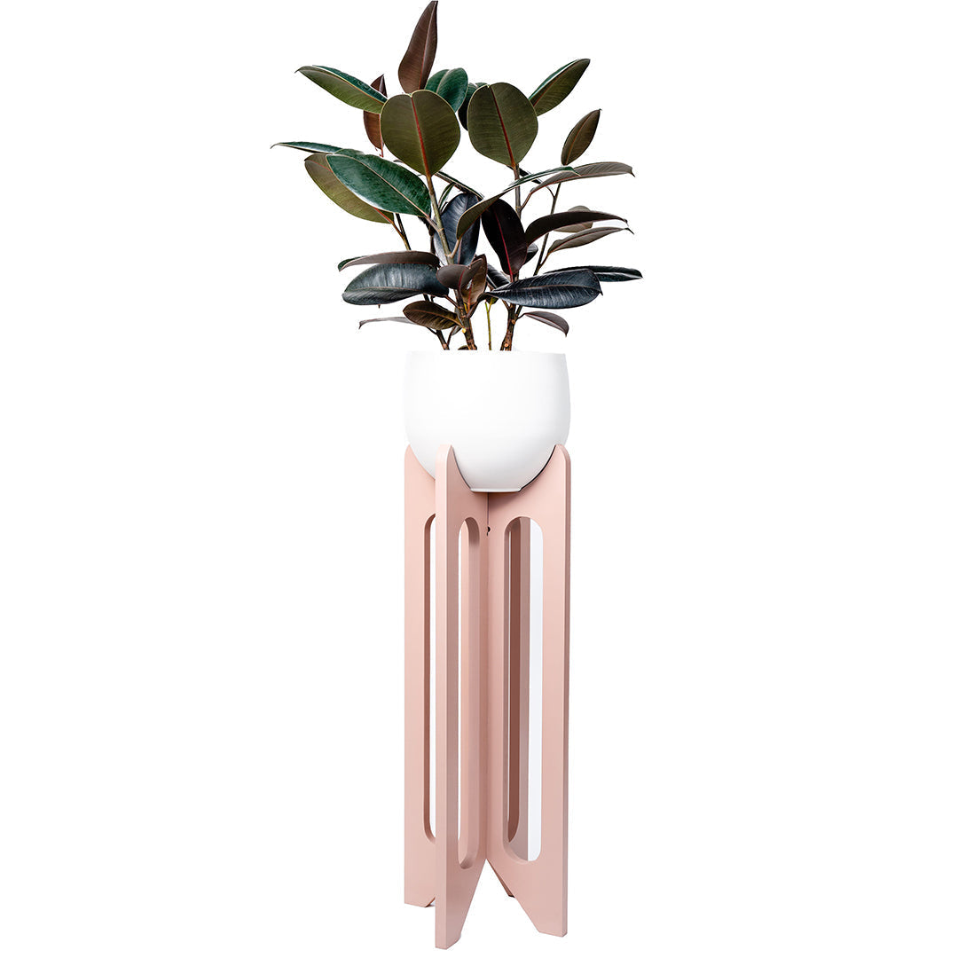 floor standing dark blush colored wood plant stand with spun aluminum pot and plant